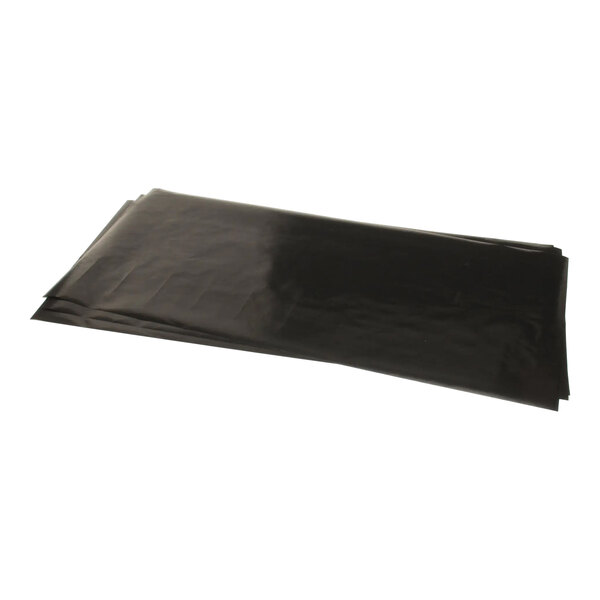 A set of three black grill platen covers.