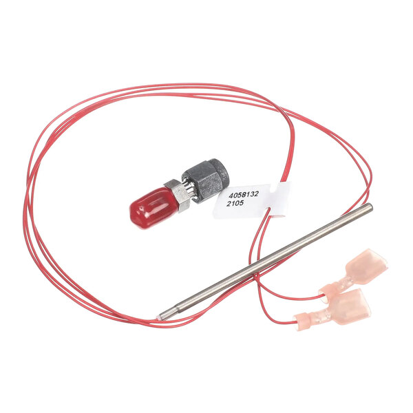 A thermistor with red wiring and connectors, used for monitoring temperature in a drawer cavity.
