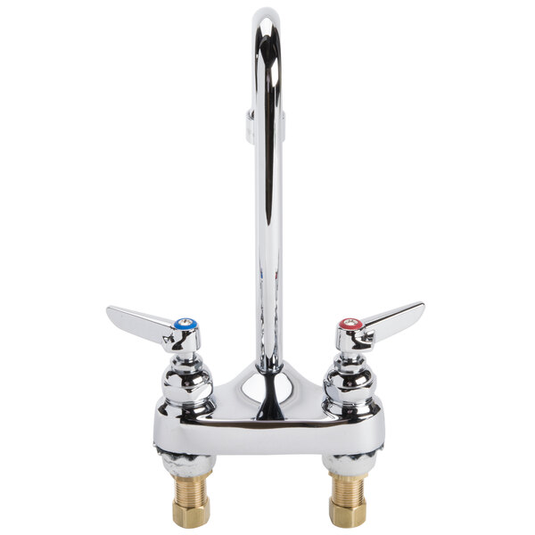 A chrome T&S medical faucet with two gooseneck spouts and lever handles.