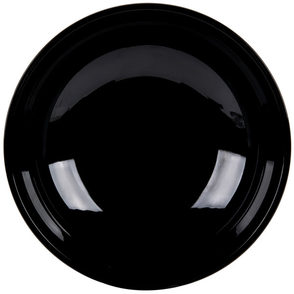 A large black round ribbed plastic bowl.