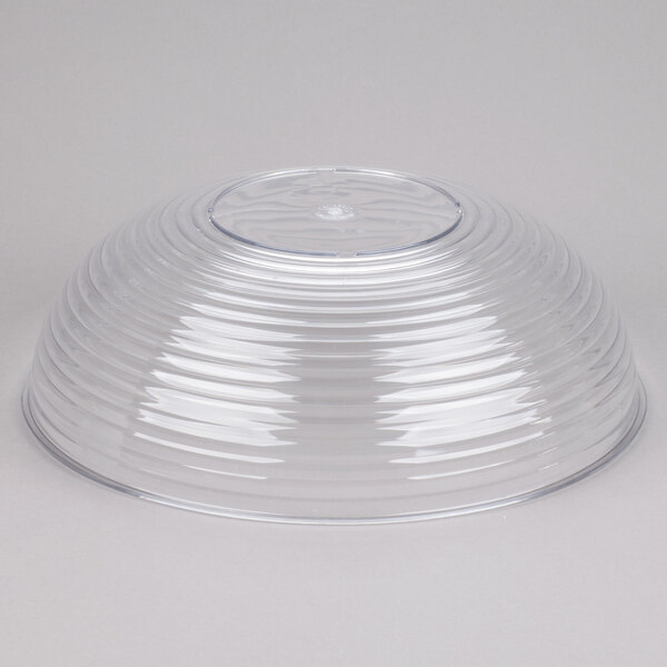 A large clear ribbed plastic bowl turned upside down.