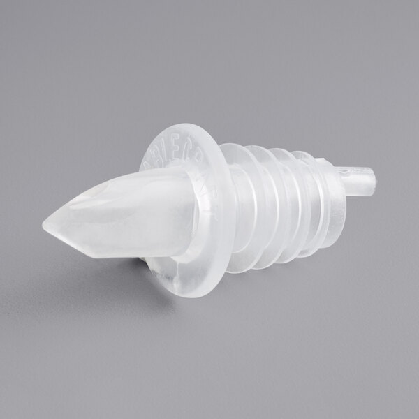 A clear plastic free flow liquor pourer with a ribbed design.