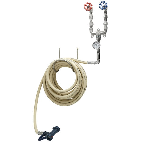 A T&amp;S washdown station with a hose, water gun, and valve on a white background.