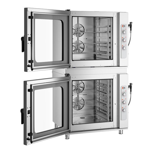 A double-stacked set of stainless steel half size electric combi ovens with manual controls and glass doors, designed to hold six pans each.