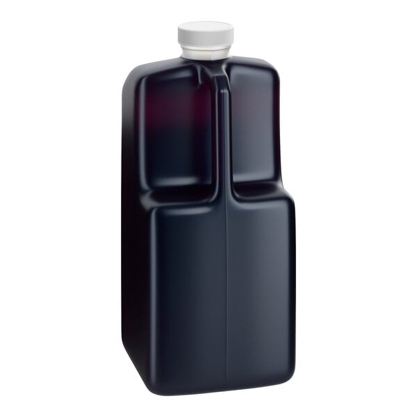 A large rectangular plastic bottle of Capora blueberry flavoring sauce with a white cap.