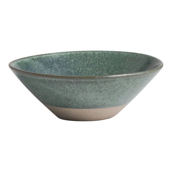 A round teal stoneware ramekin with a textured finish and a slightly flared rim.