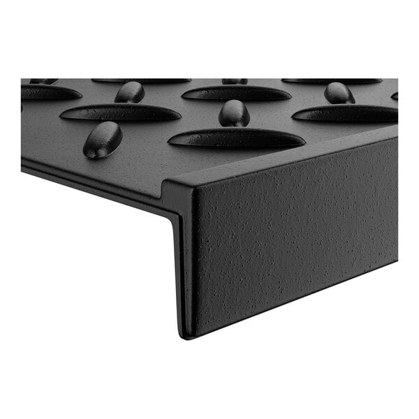 A black criss-cross rubber stair tread mat with a textured surface.