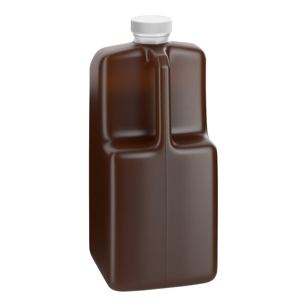 A large brown plastic bottle with a white cap containing Capora Pumpkin Pie Flavoring Sauce.