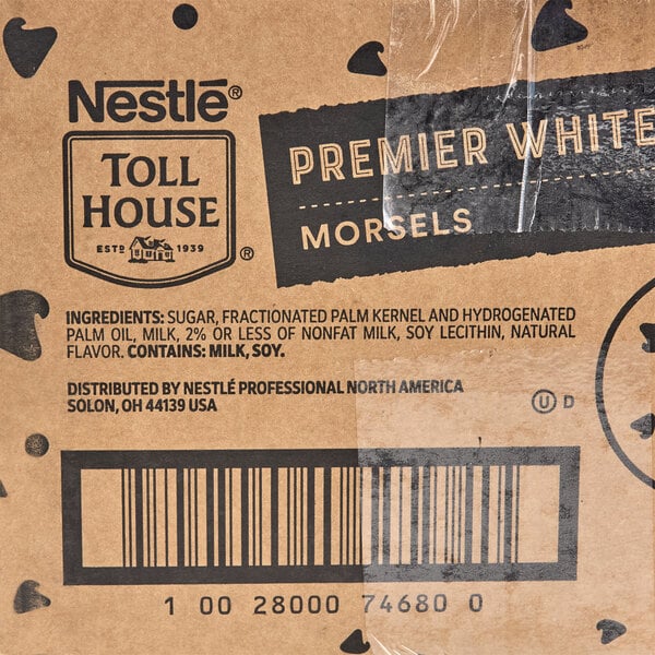 A box of Nestle Toll House Premier White Morsels weighing 25 pounds.