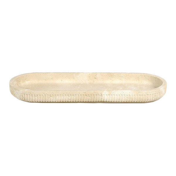 A beige oval resin amenity tray with a textured edge.