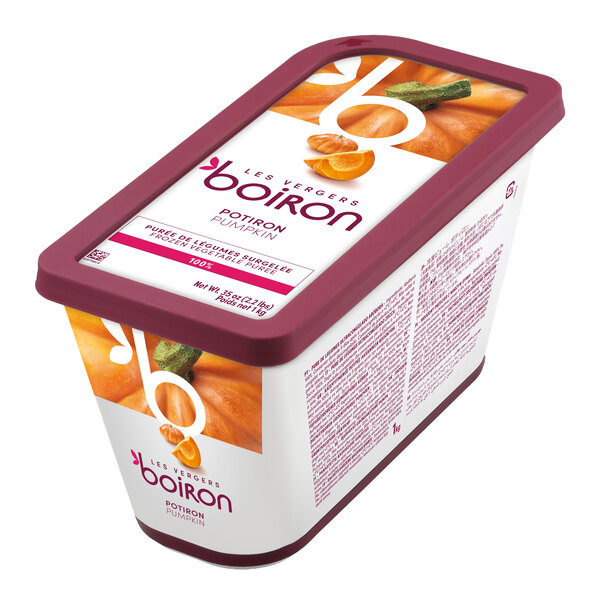 A rectangular container with a maroon lid, labeled as Boiron pumpkin puree, featuring images of pumpkin pieces and seeds on the packaging.