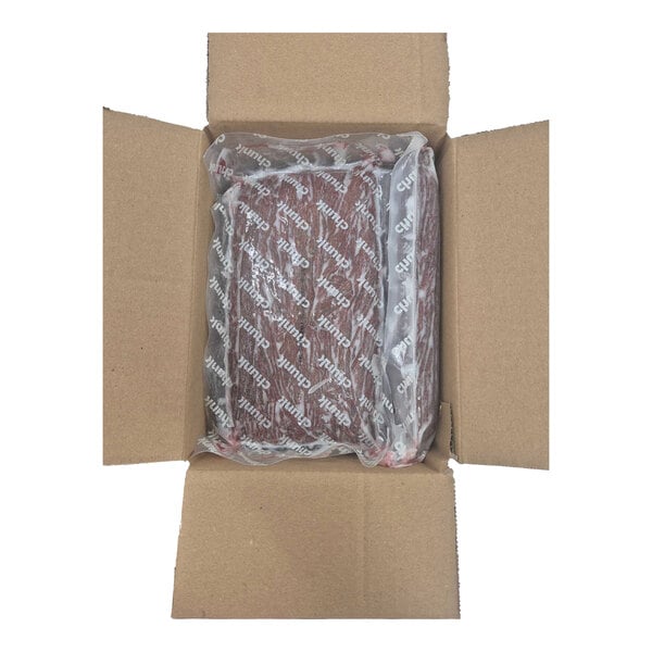 A box containing a vacuum-sealed slab of plant-based vegan steak.