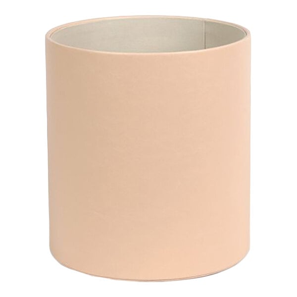 A cylindrical wastebasket with a clay-colored faux leather exterior.
