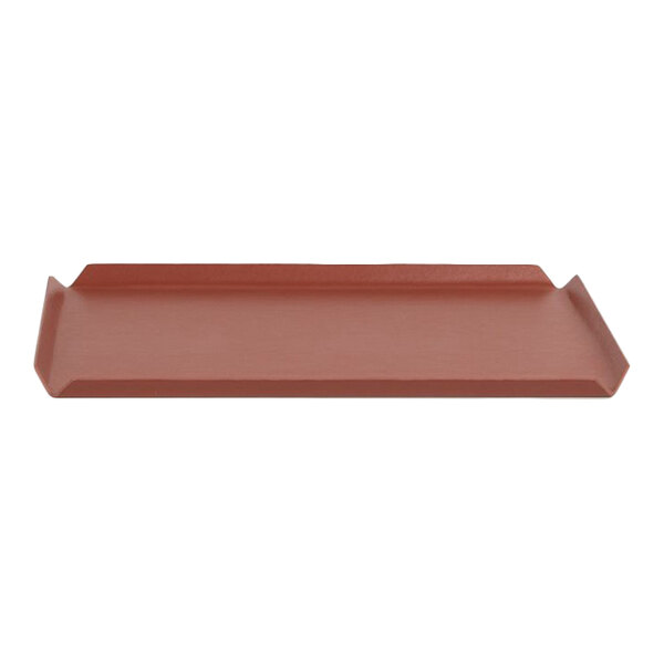 A rectangular faux leather amenity tray in a canyon orange color.