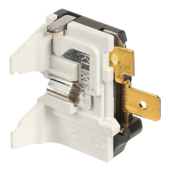 An electrical overload protector component with a white plastic body and metal connectors.
