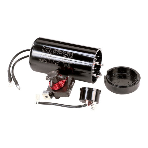 A start component kit for refrigeration units, including a capacitor, relay, and related parts.