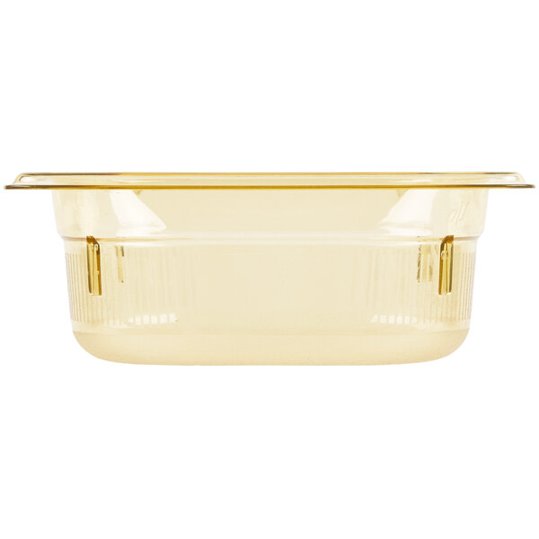 A yellow plastic Vollrath Super Pan with a lid.