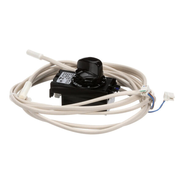 A digital control box assembly with attached cables and connectors.