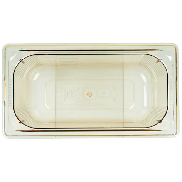 A clear plastic Vollrath food pan with a lid.