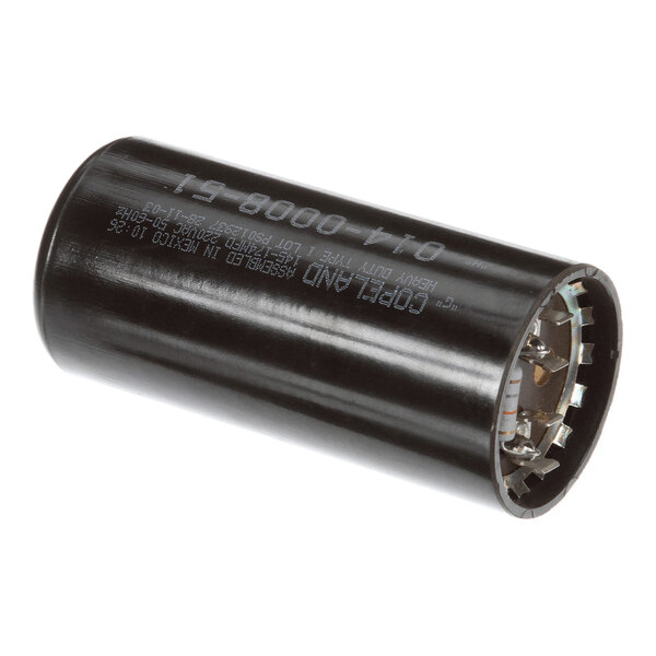 A cylindrical black start capacitor with metal terminals on one end, used in refrigeration equipment.