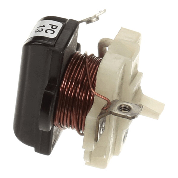 A refrigerator relay component with a copper coil and plastic housing.