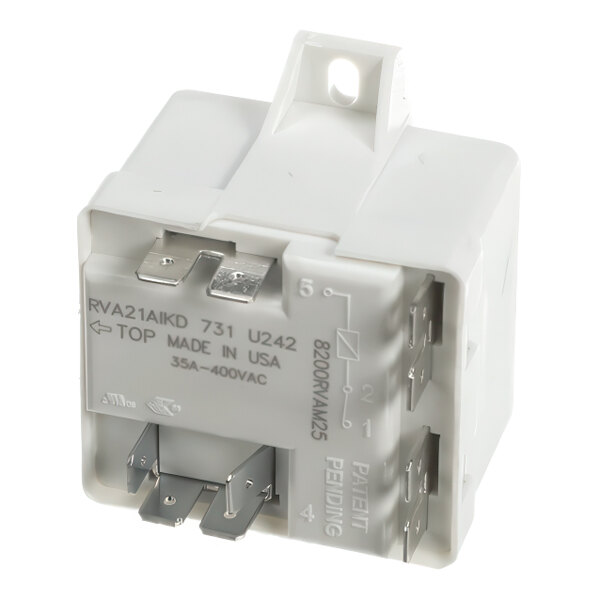 A white electrical relay component with metal prongs, labeled for use in True Refrigeration systems.