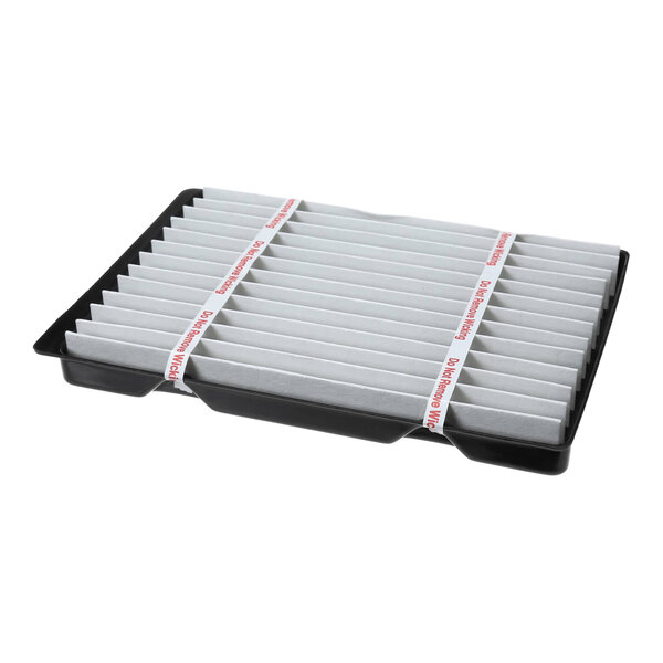 A rectangular plastic condensate pan assembly with a pleated filter, designed for use in Beverage-Air refrigeration units.