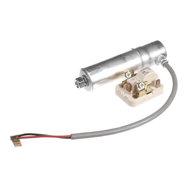 A True Refrigeration 213125 start component kit with a cylindrical metal capacitor, electrical terminals, and attached wiring.