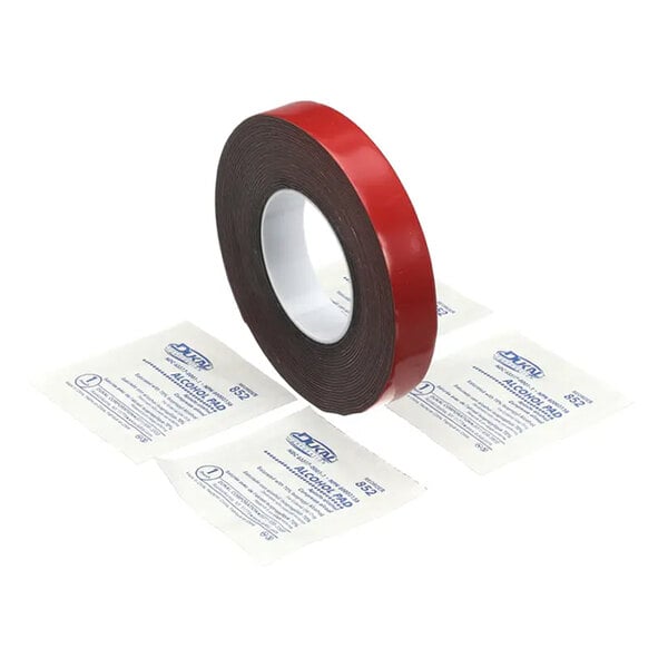 A roll of VHB tape with a red liner, accompanied by four individually packaged alcohol pads.