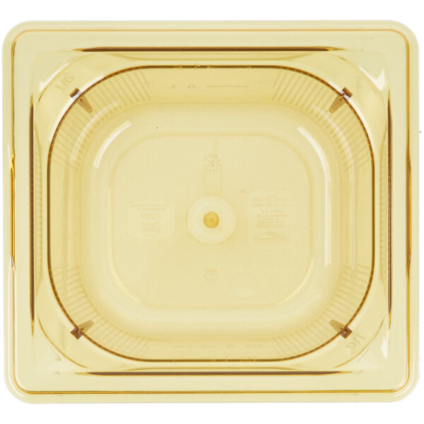 A square yellow plastic food pan with a white lid.