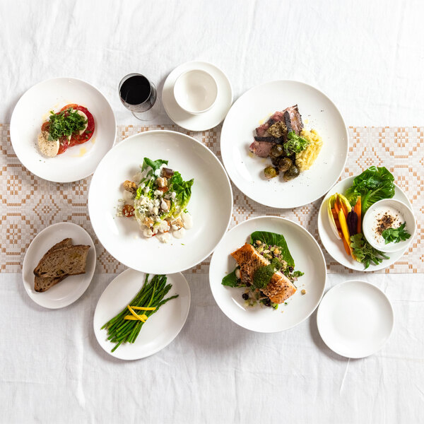 Tuxton Midtown AlumaTux 7 1/8" Pearl White China Coupe Plate - 36/Case