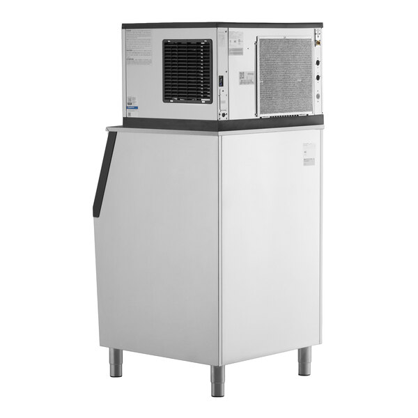 An air-cooled modular half cube ice machine with a large storage bin.