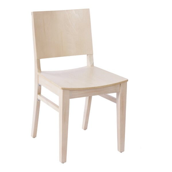 A light-colored solid wood dining chair with a simple, modern design and a slightly curved backrest.