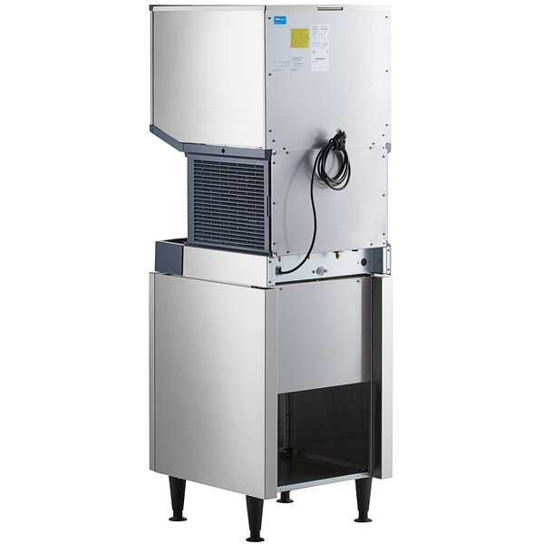 A commercial air-cooled nugget ice machine with a built-in bin, push button ice and water dispensing, and an equipment stand.