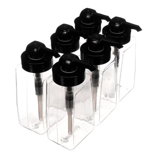 A set of six clear glass dispensers with black pump tops.