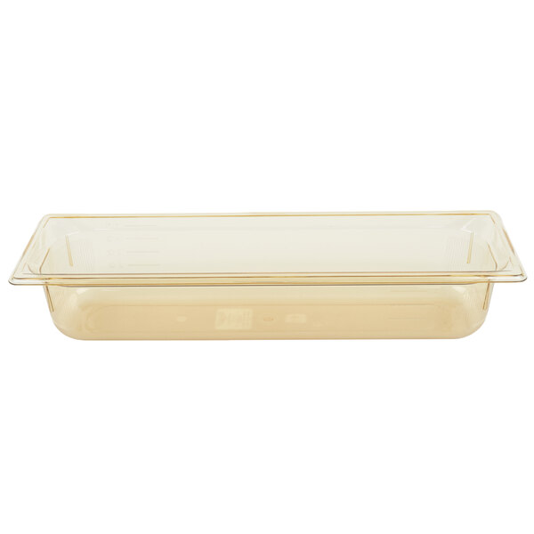 A Vollrath amber plastic food pan with a lid.