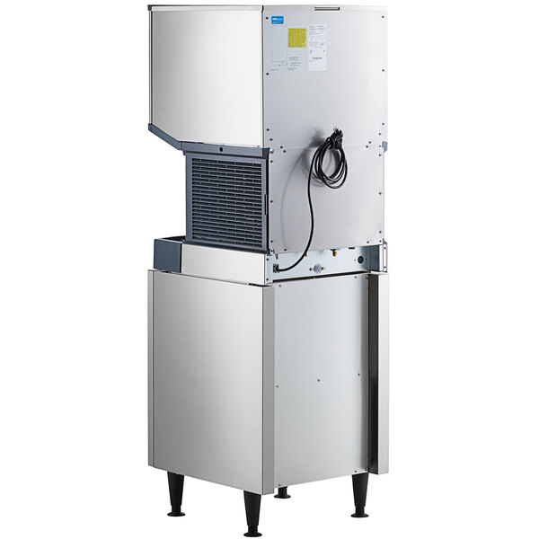 A commercial air-cooled nugget ice machine with a built-in bin, push button dispensing, and a storage equipment stand.