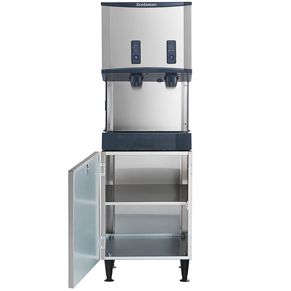 A commercial Scotsman air-cooled nugget ice and water dispenser with a 25 lb. bin and an open storage equipment stand.