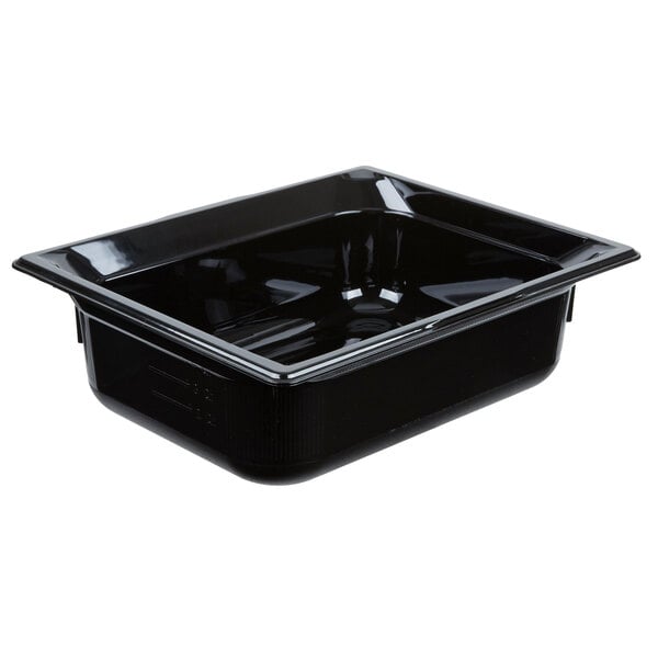 A black plastic Vollrath food pan on a counter.
