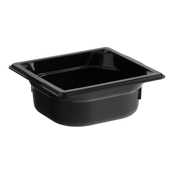A black plastic Vollrath food pan on a table.