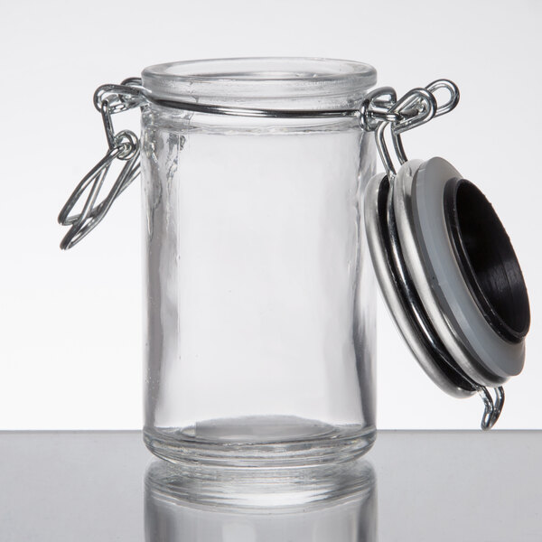 Tablecraft 2 oz. Resealable Salt and Pepper Shaker Glass Jar with Stainless Steel Clip-Top Lid - 6/Case