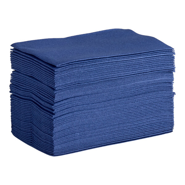 A stack of navy blue airlaid linen-feel guest towels folded in a 1/6 style.