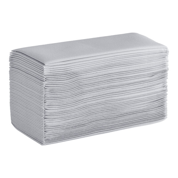 A stack of gray airlaid linen-feel guest towels folded in a 1/6 style.