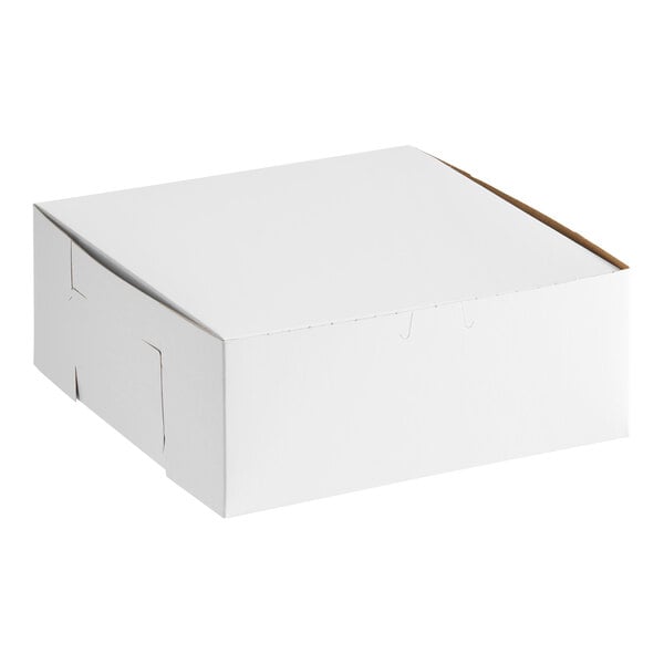 A plain white, square bakery box with a closed lid, suitable for cakes or pastries.