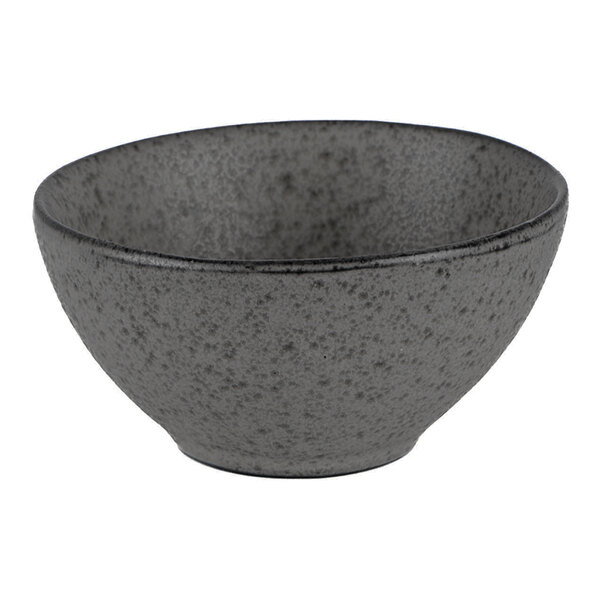 A round charcoal-colored stoneware tea cup with a speckled finish.