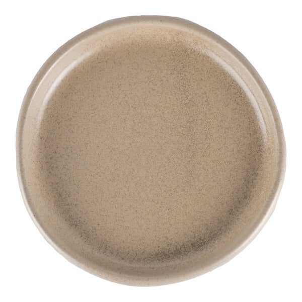 A round tan stoneware plate.