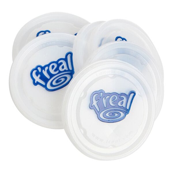 A set of clear plastic lids with a blue 'f'real' logo and a straw slot.