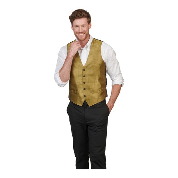 A men's gold brocade diamond pattern server vest with black buttons, worn over a white shirt and black pants.