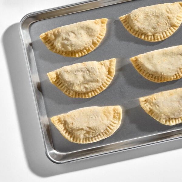 Rico Foods Chicken and Cheese Flour Shell Empanada 4 oz. - 24/Case
