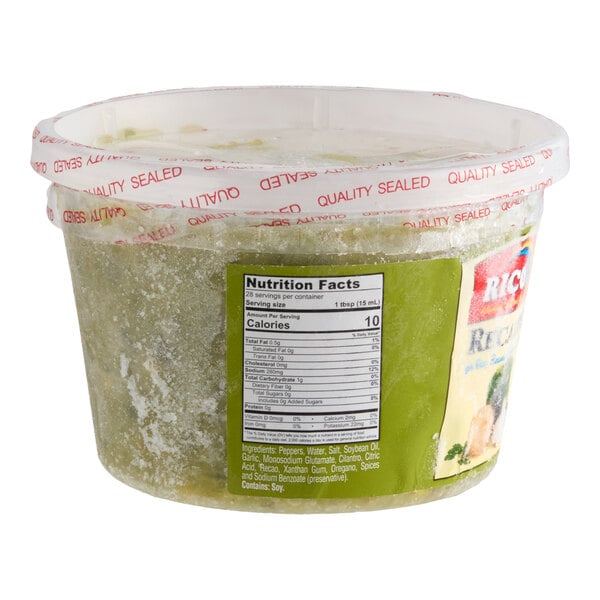 A plastic container of Rico Foods Recaito Cooking Sauce with a sealed lid and nutrition facts label.